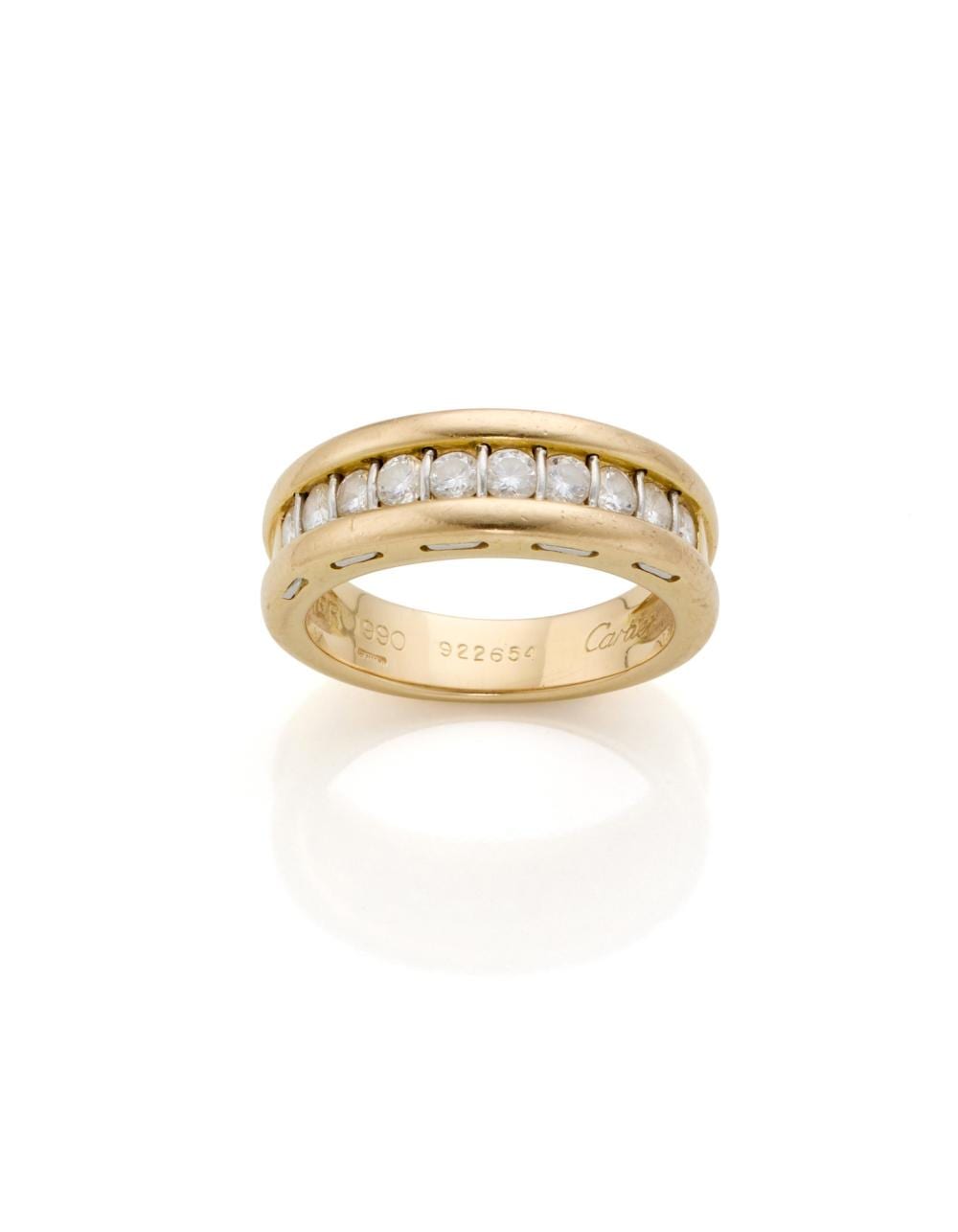 CARTIER Round diamond and bi-coloured 18K gold ring, diamonds in all ct. 0.60 circa, g 8.78 circa size 14/54. Signed and marked Cartier 1990, 1140 MI and inventory number.... sold by Il Ponte Auction House, lot 767 — auction record photograph