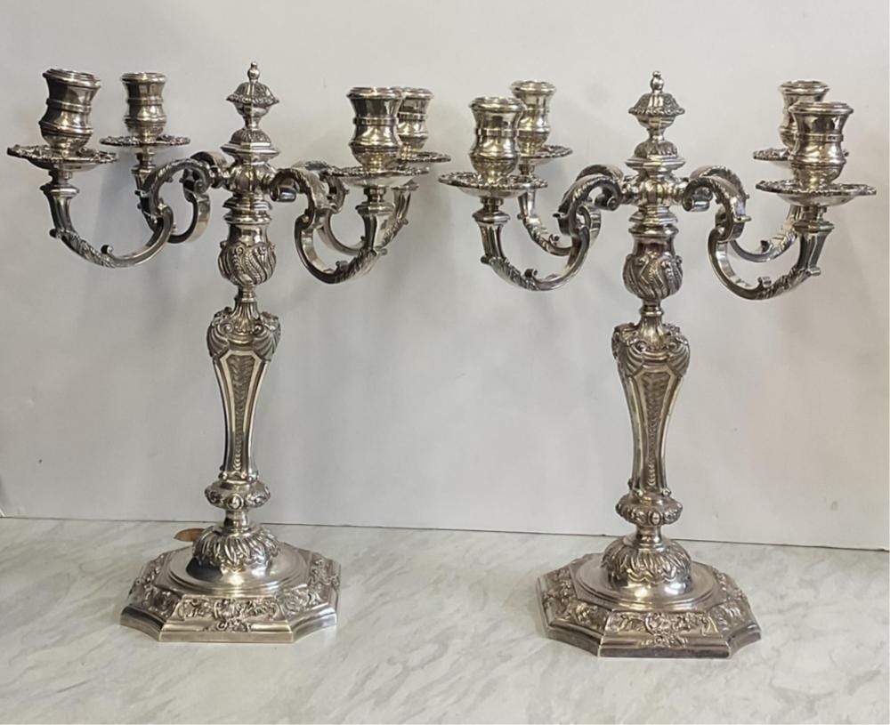 Paul de Lamerie comparable auction result: a pair of louis xiv style heavy cast silver four light candelabra after paul de lamerie