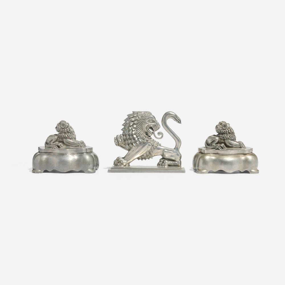 Anna Petrus comparable auction result: anna petrus lion bookend and inkwells pair