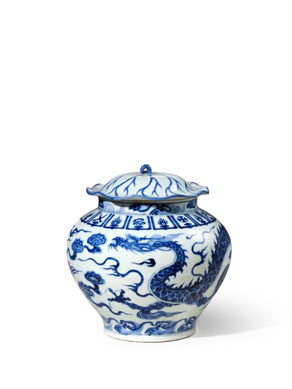 An extremely rare and superbly painted blue and white 'dragon' jar and cover, Yuan dynasty | 元　青花雲龍紋蓋罐 comparable sale
