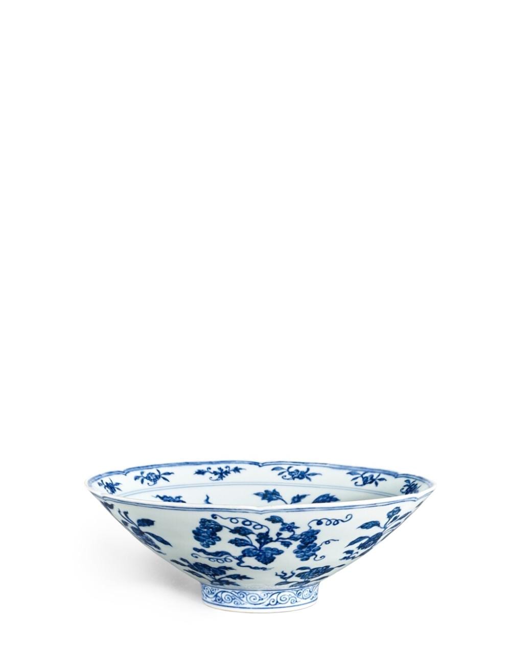 A fine and very rare blue and white lobed bowl, Mark and period of Xuande | 明宣德　青花折枝花果紋葵式盌　《大明宣德年製》款 comparable sale