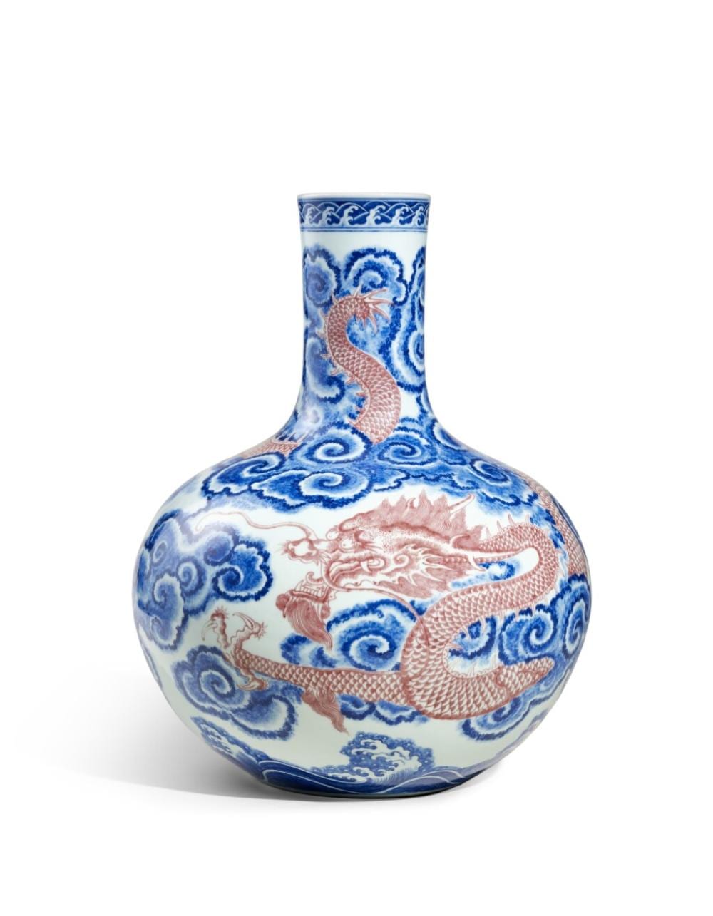 A magnificent and exceptionally rare copper-red and underglaze-blue ‘dragon’ vase, tianqiuping, Seal mark and period of Qianlong | 清乾隆　青花釉裏紅雲龍紋天球瓶　《大清乾隆年製》款 comparable sale