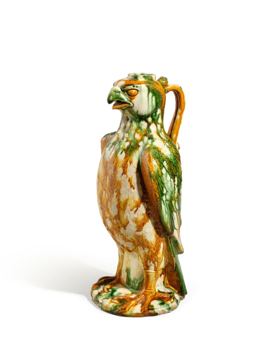 An extremely rare sancai-glazed hawk-form ewer, Tang dynasty, 8th century | 唐八世紀　三彩鷹形壺 comparable sale