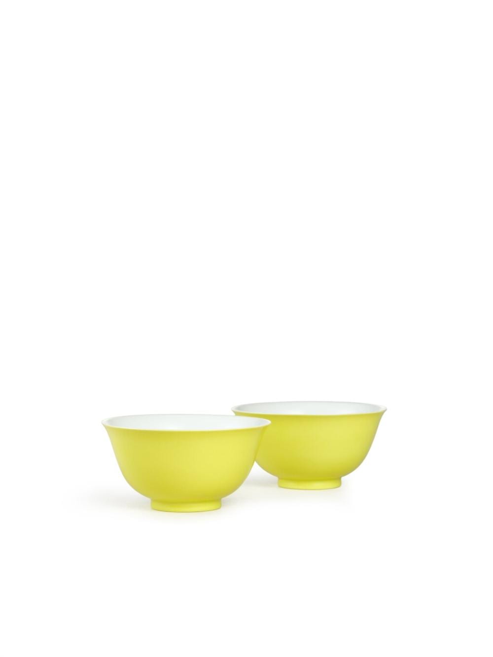 A fine pair of lemon-yellow enamelled bowls, Marks and period of Yongzheng | 清雍正　檸檬黃釉盌一對　《大清雍正年製》款 comparable sale