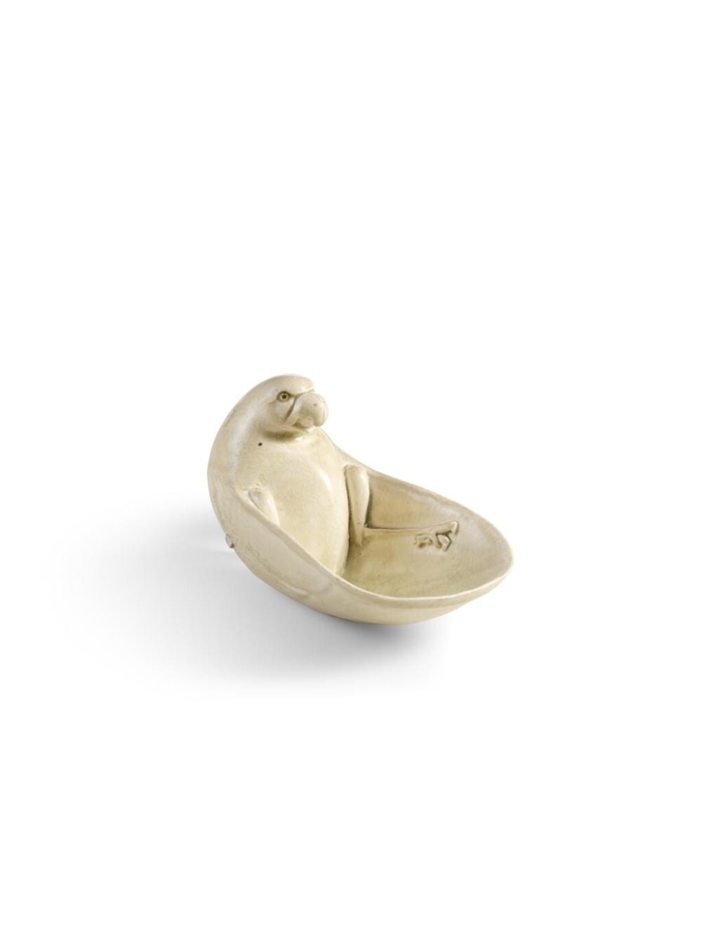A very rare transparent-glazed 'parrot' cup, Sui - early Tang dynasty | 隋至唐初　白瓷鸚鵡盃 comparable sale