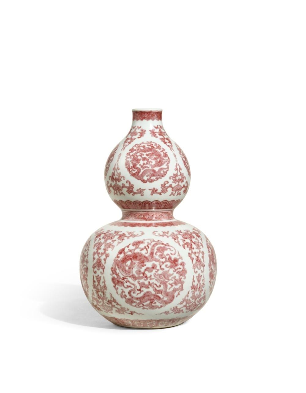 A fine and rare copper-red decorated 'chilong' double-gourd vase, Seal mark and period of Qianlong | 清乾隆　釉裏紅團螭靈芝紋葫蘆瓶　《大清乾隆年製》款 comparable sale