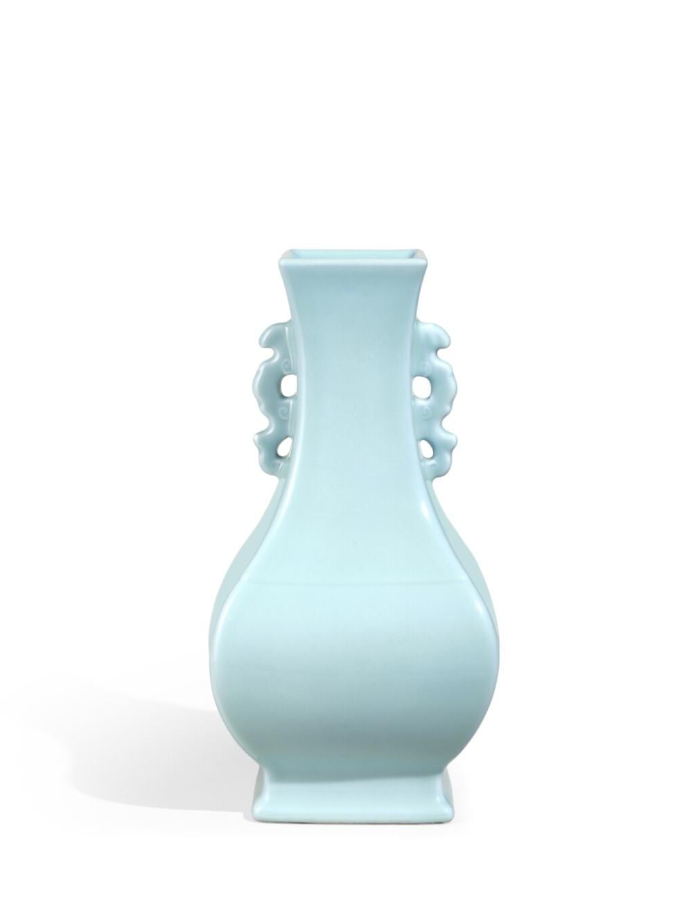 A fine and very rare clair-de-lune-glazed dragon-handled vase, fanghu, Seal mark and period of Qianlong | 清乾隆　天藍釉雙龍耳方壺　《大清乾隆年製》款 comparable sale