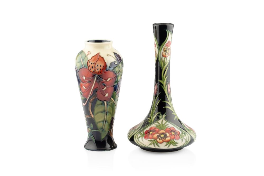 Philip Gibson comparable auction result: philip gibson for moorcroft pottery two vases simeon pattern and one other floral design with impressed marks to the base simeon vase 21cm high the other vase 23cm high 2