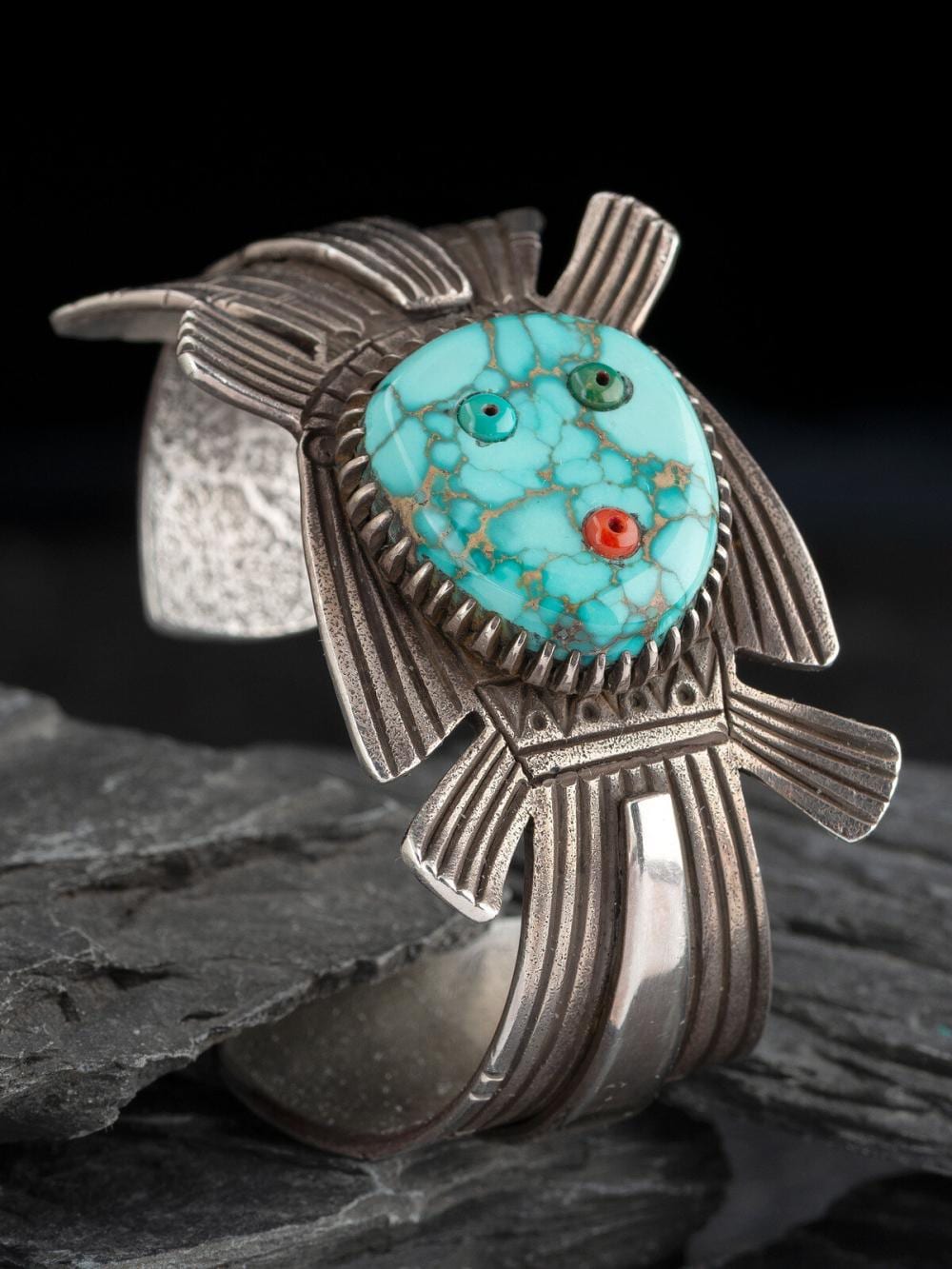 Tony Abeyta comparable auction result: tony abeyta din b 1965 tufa cast silver and turquoise yeibichai cuff bracelet