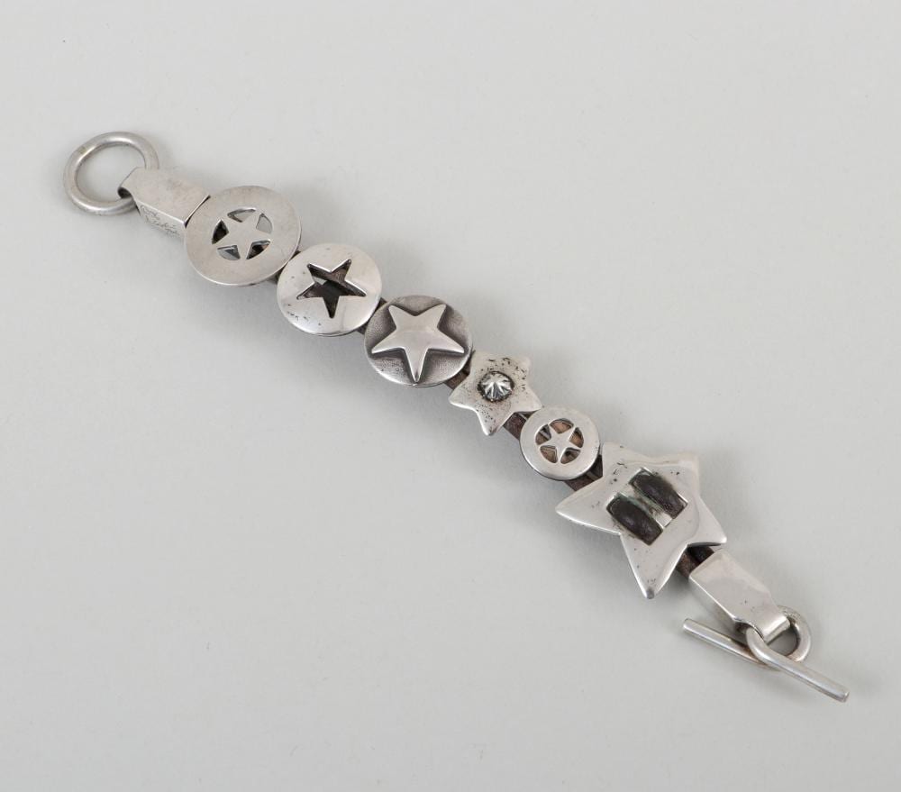 Arnold Goldstein comparable auction result: arnold goldstein american 20th 21st century sterling silver star concho bracelet