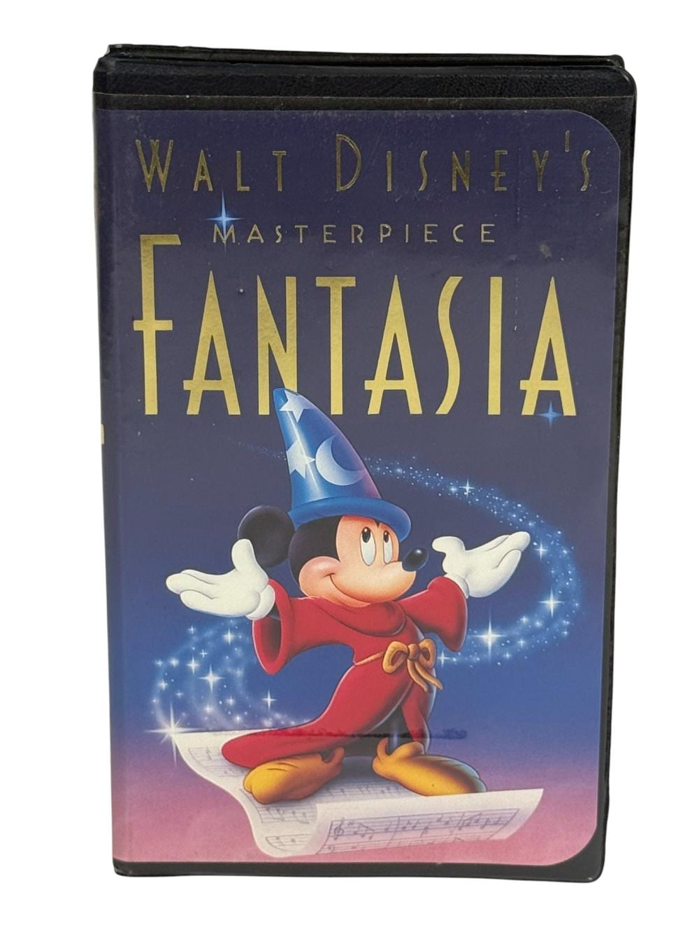 Front cover of a VHS tape case showing Walt Disney’s Fantasia with Mickey Mouse in a magician hat casting a spell.