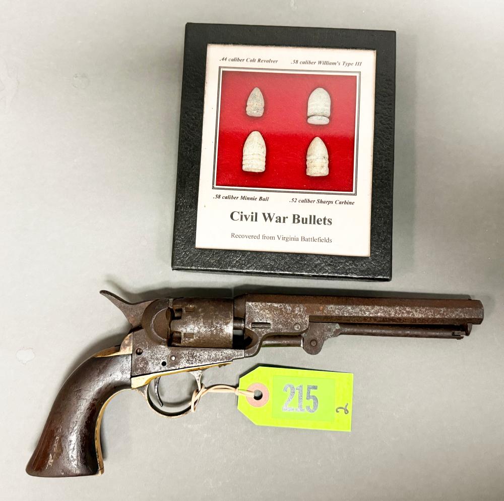 (2) Firearm Related Items: antique Colt revolver,36? Cal; matching numbers; incised on brass butt ‘J. L. Ludwig’ (listed in OHIO registry) a little rough; and a display of (4) Civil War Era bullets in case goes with marked ‘Recovered from VA Battlefi sold by Roan Inc. Auctioneers & Appraisers, lot 215 — auction record photograph