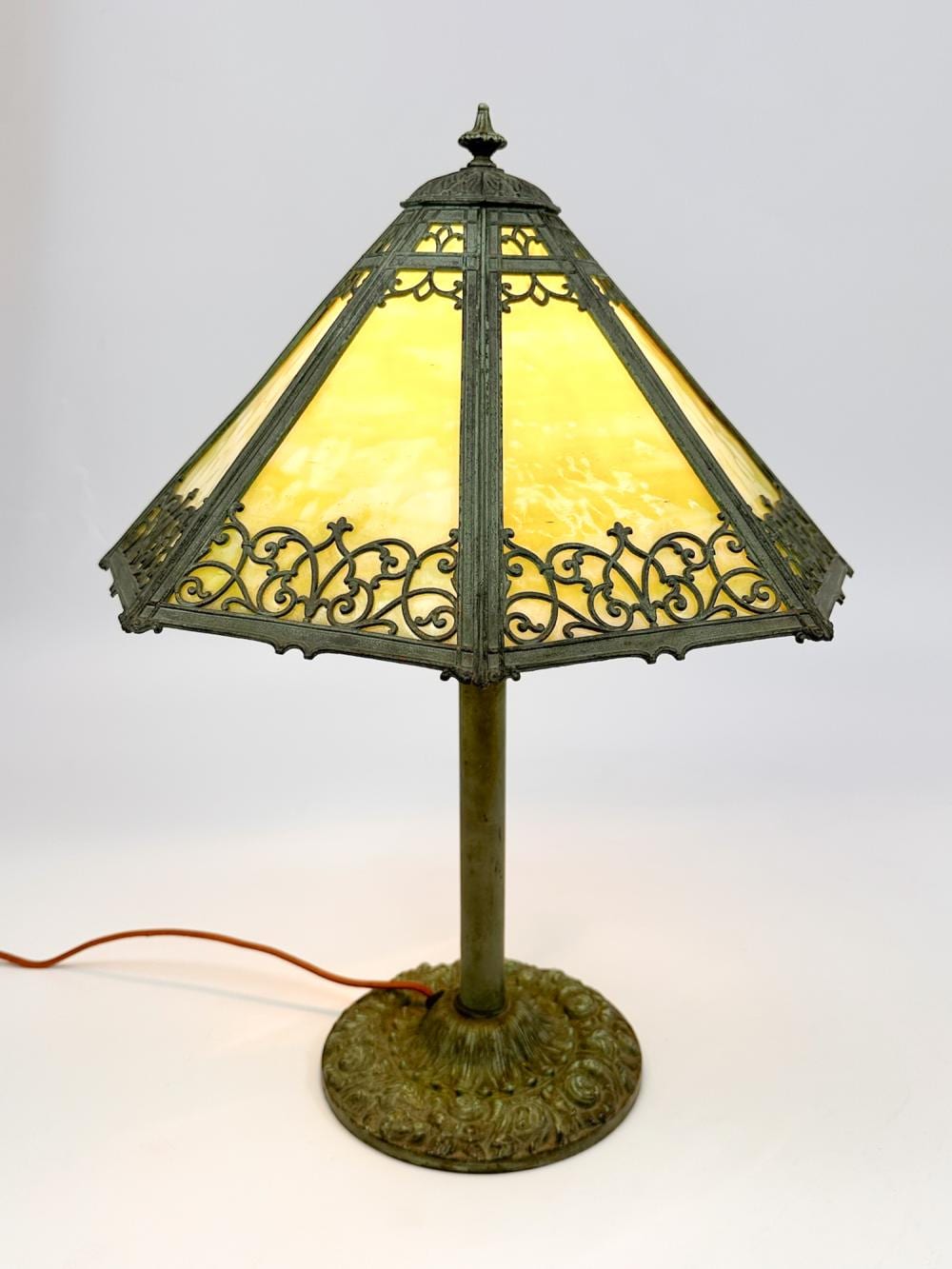 Edward Miller comparable auction result: edward miller co slag glass and metal table lamp
