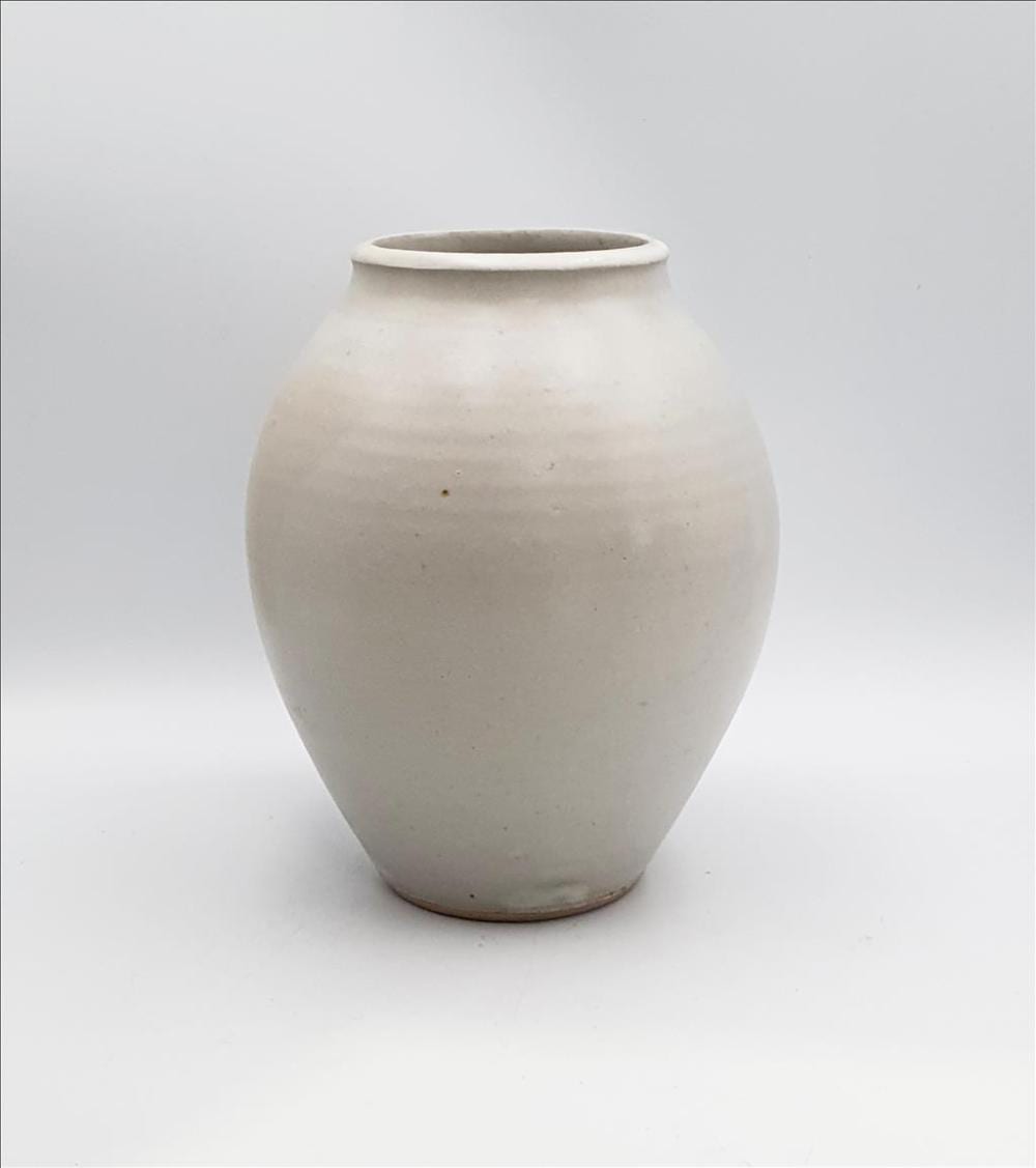 col levy 1933 a stone ware vase of urn form with pale grey glaze impressed mark to base height 20 cm · Raffan Kelaher & Thomas · 2025-12-09 Col Levy comparable auction result: col levy 1933 a stone ware vase of urn form with pale grey glaze impressed mark to base height 20 cm