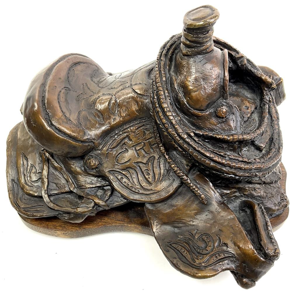 Herb Mignery comparable auction result: herb mignery b 1937 bronze saddle sculpture