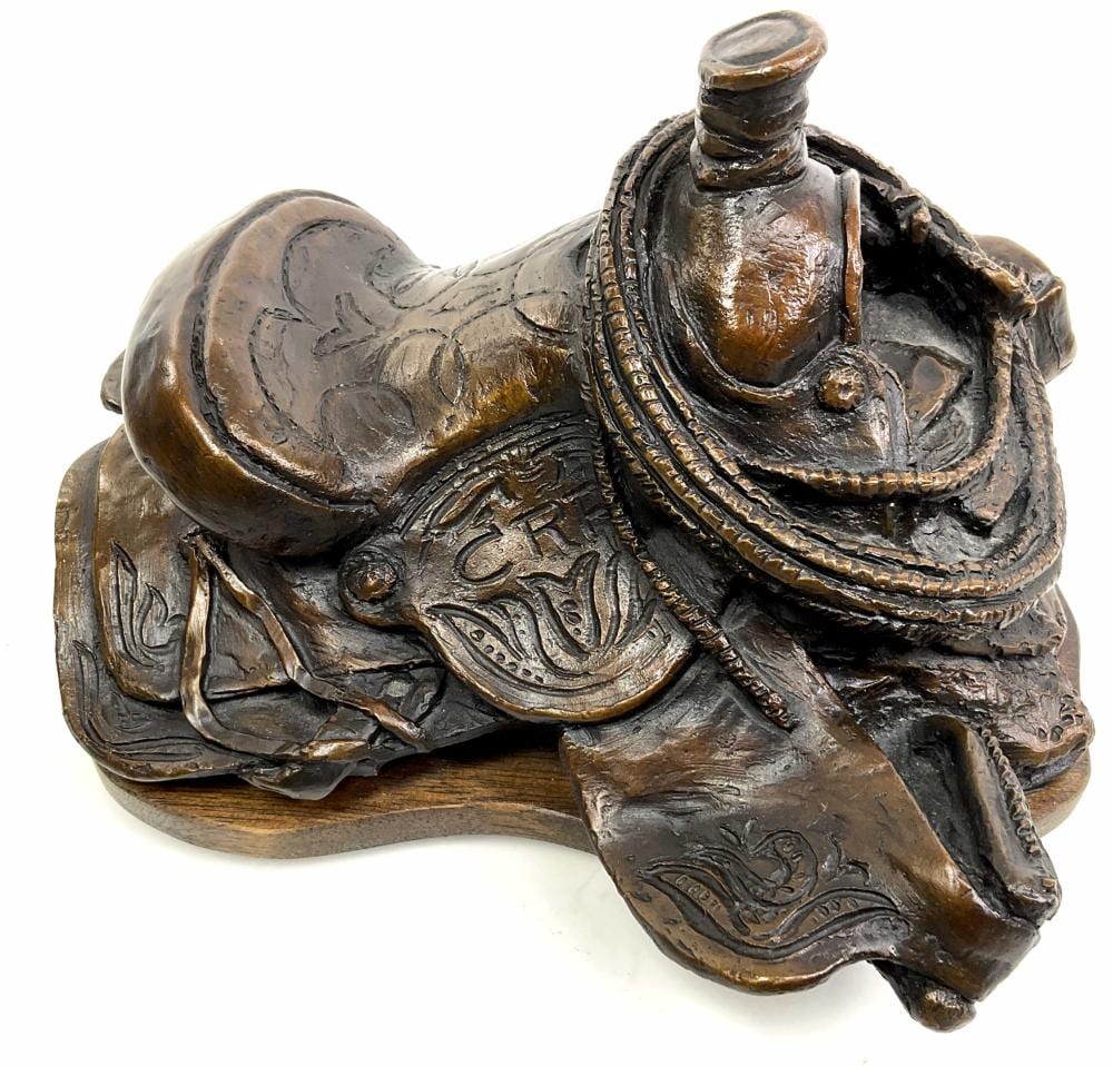 Herb Mignery comparable auction result: herb mignery b 1937 bronze saddle sculpture