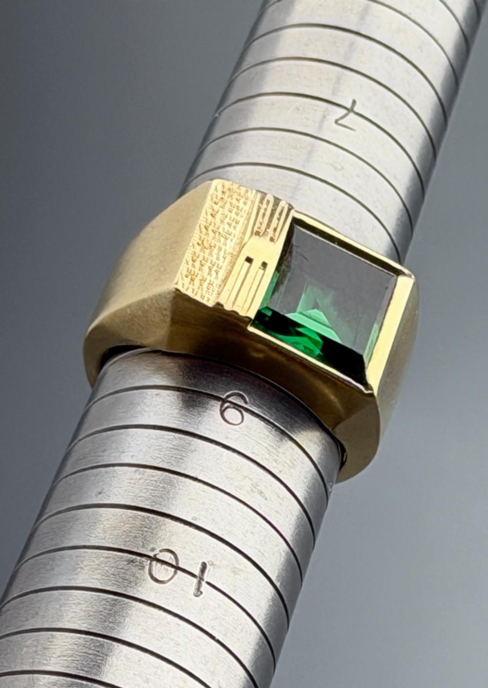 Auction comp thumbnail for 10k Gold Solitaire Ring Emerald Cut Lab Created Green Stone in Bezel Setting Vintage Estate Jewelry Size 8 1/2 (Vidi Vici Gallery, Lot 348)
