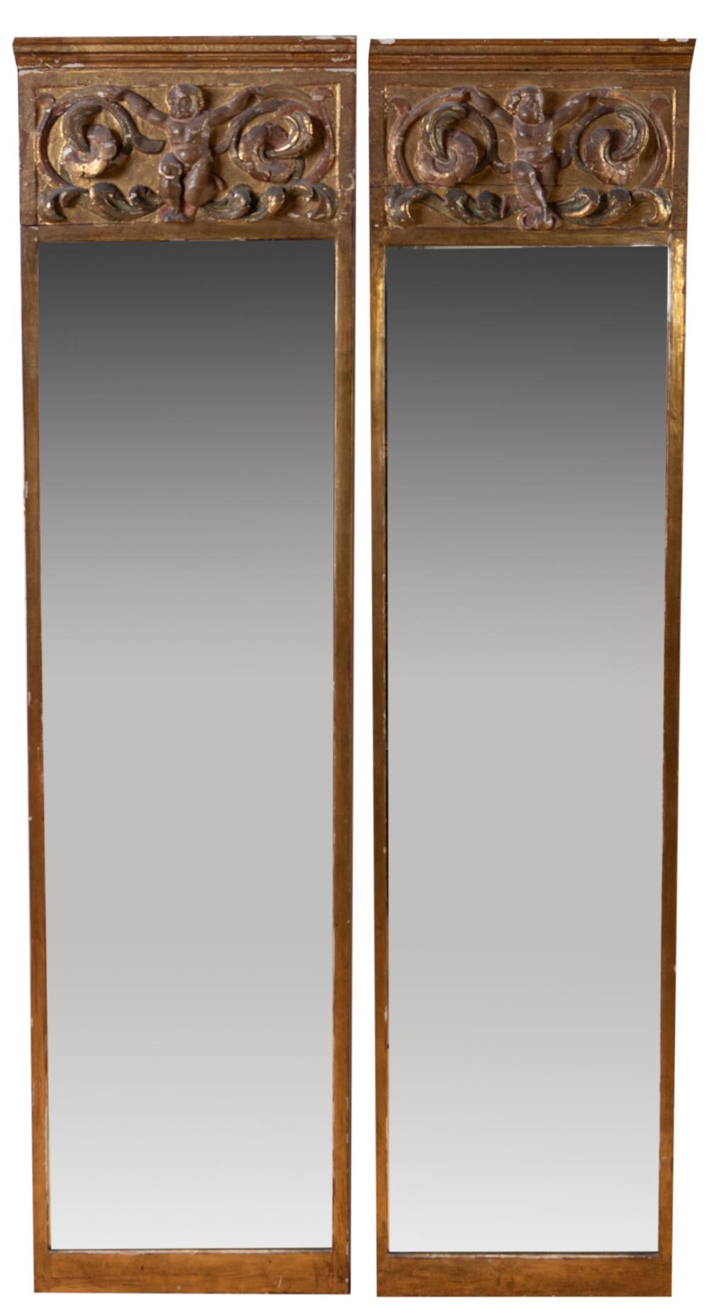 Pair of mirrors with antique carved and polychrome wood altarpiece fragments frame sold by Bayeu Subastas, lot 681 — auction record photograph