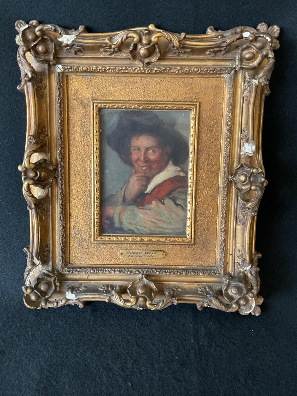 framed oil on panel titled smiling youth by rudolf wolf · Diederich Auction Gallery · 2026-01-04 Rudolf (1877) Wolf comparable auction result: framed oil on panel titled smiling youth by rudolf wolf