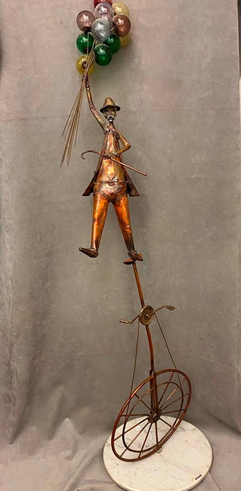 Jim Lewk comparable auction result: jim lewk french us b 1940 gentleman on a unicycle whimsical copper sculpture depicting a figure in a stylized somewhat dapper ou