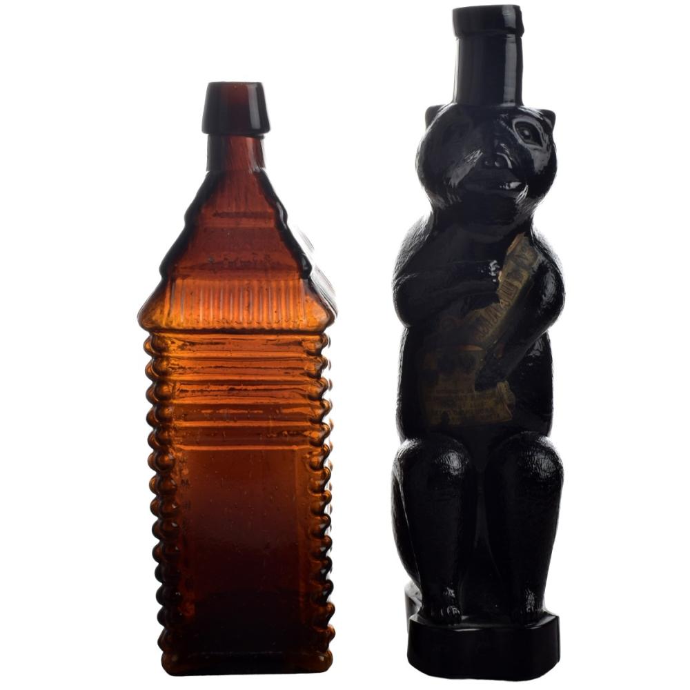 Antique Brown Glass Bottles sold by Kodner Galleries, lot 81 — auction record photograph