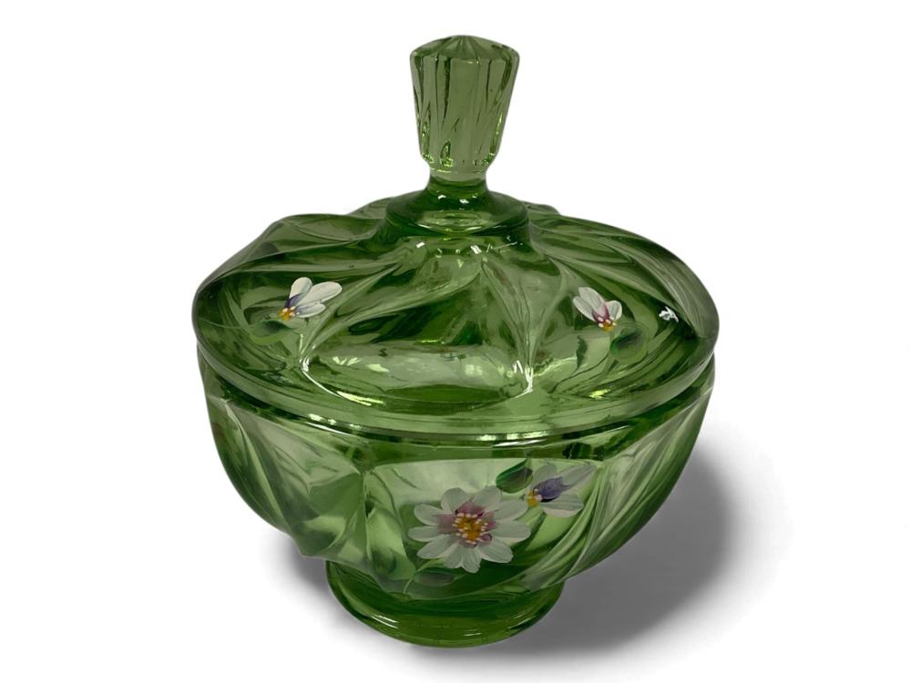 Green glass covered candy dish with a knob lid and painted floral flowers on the body.