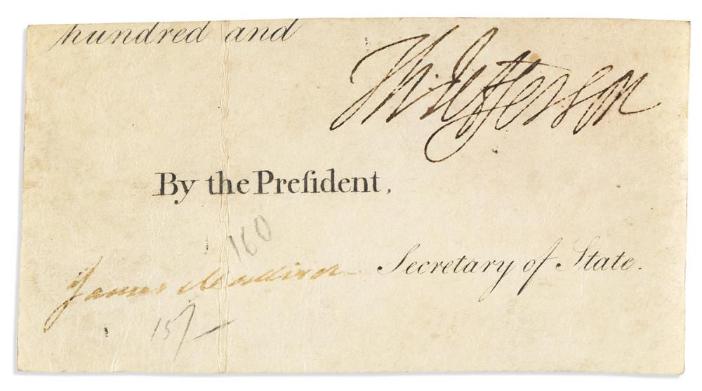 Jefferson comparable auction result: jefferson thomas and james madison clipped portion of partly printed vellum document signed by both as president or secretary of s