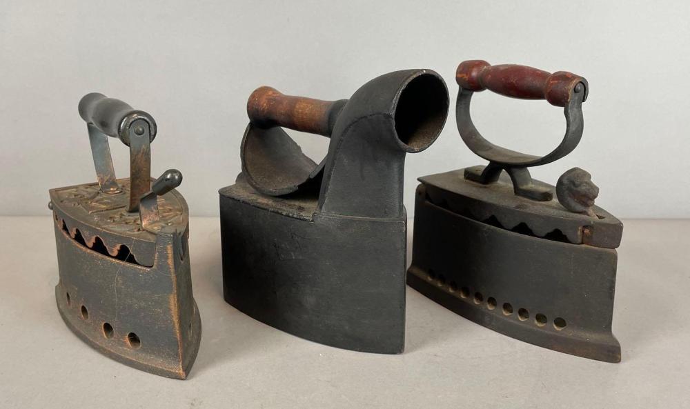 Group of 3 Antique Sad Irons sold by Matthew Bullock Auctioneers, lot 38 — auction record photograph