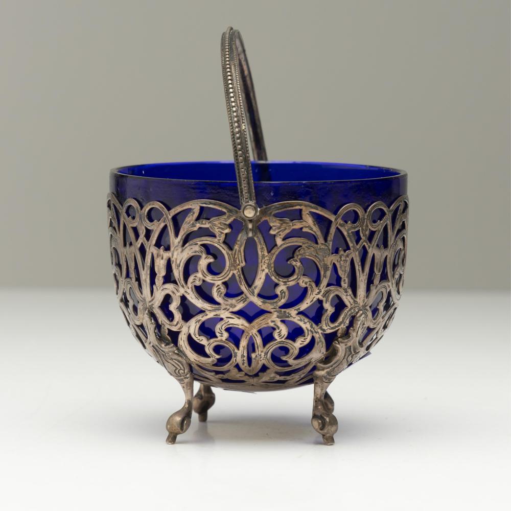An English Victorian hallmarked sterling silver bowl with swing handle, Birmingham, c1858 By George Unite (H:9.5cm x Dia:10.5cm) (wt.176grams) sold by Lawsons, lot 28 — auction record photograph