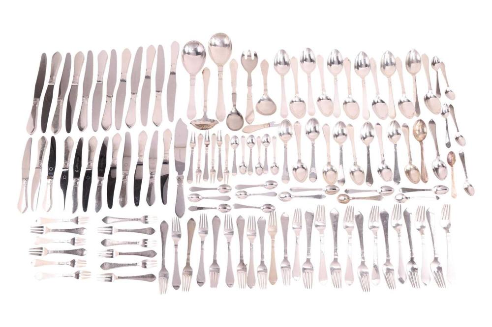Georg Jensen - a Danish sterling silver Continental (Antik) pattern table service of flatware, circa 1940 to present, comprising; 12 table forks, 12 dessert forks, 12 table spoons, 12 dessert spoons, 12 teaspoons, 12 oyster forks, 12 coffee... sold by Dawsons Auctioneers, lot 432 — auction record photograph