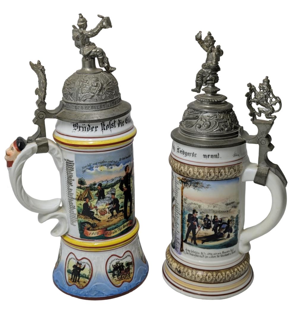 Lot of 2 Antique Regimental German Lithopone Bottom Beer Steins Military Soldier Finials 1905 1907 12.25 and 11.625 Inches sold by Hess Fine Art, lot 1430 — auction record photograph