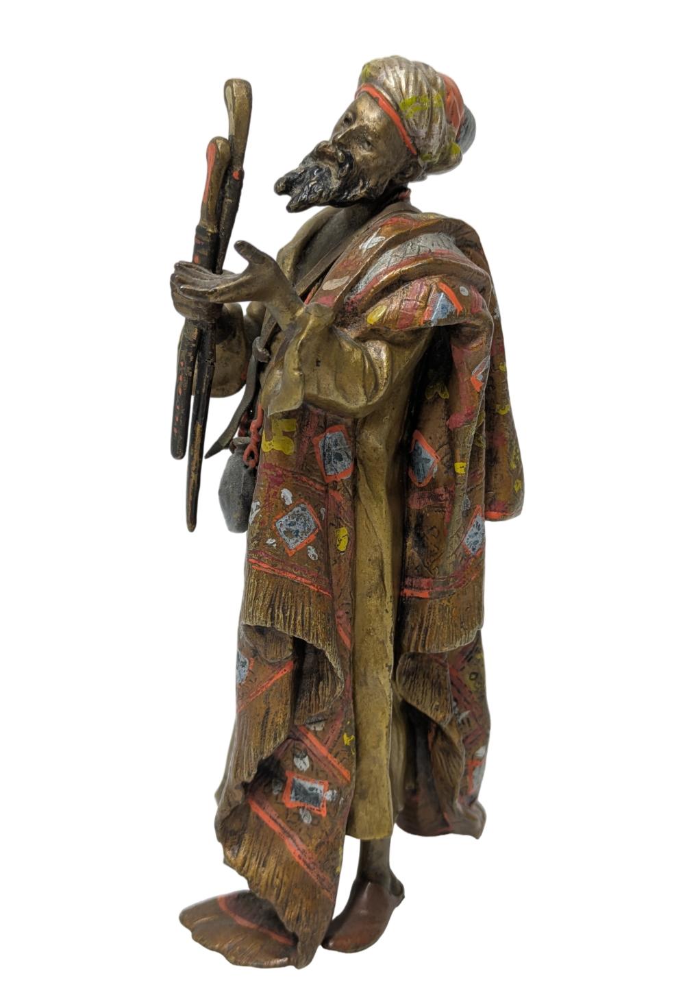 Auction comp thumbnail for Franz Bergman Signed Austrian Cold Painted Vienna Bronze Arab 7.25 Inch Arab Market Figure Arms Merchant Statue Sculpture Antique Orientalist (Hess Fine Art, Lot 1437)