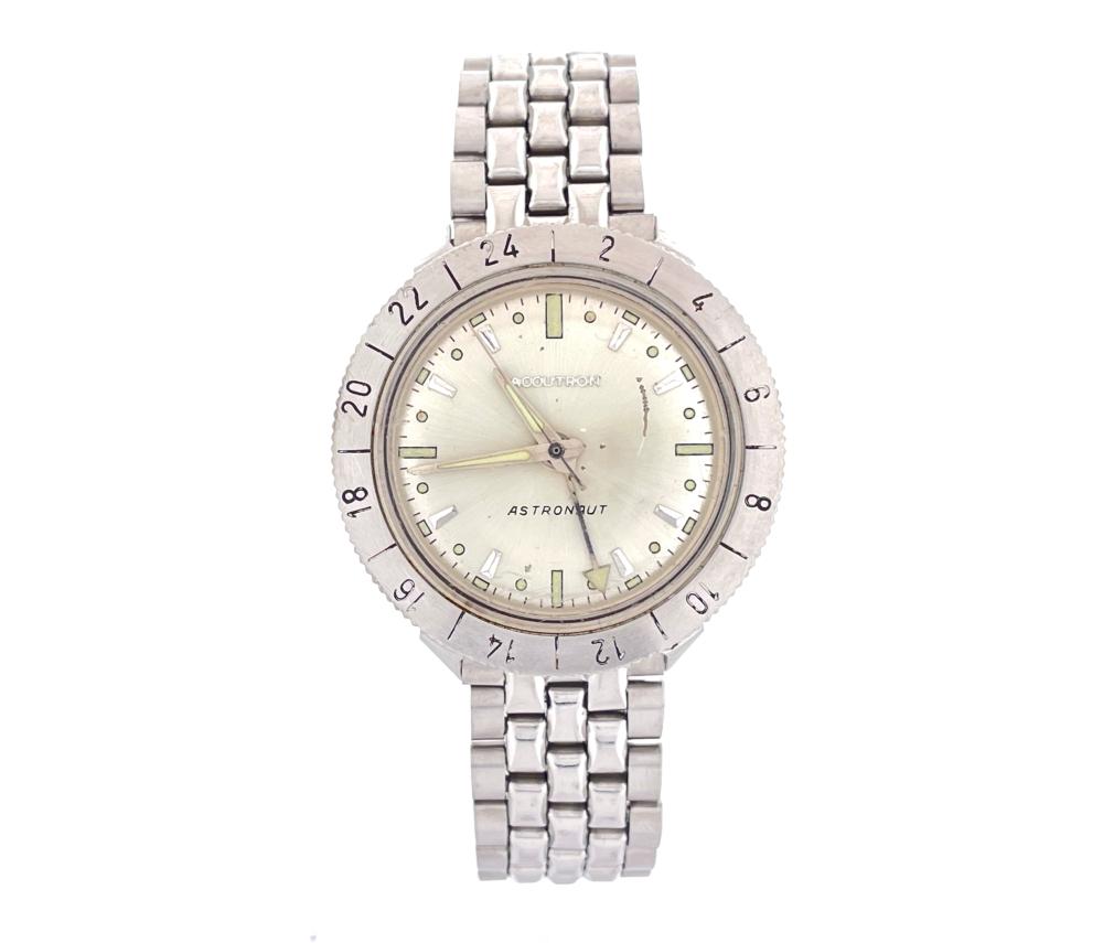 Vintage Bulova Accutron Astronaut watch with silver metal bracelet and white dial featuring hour markers and hands.