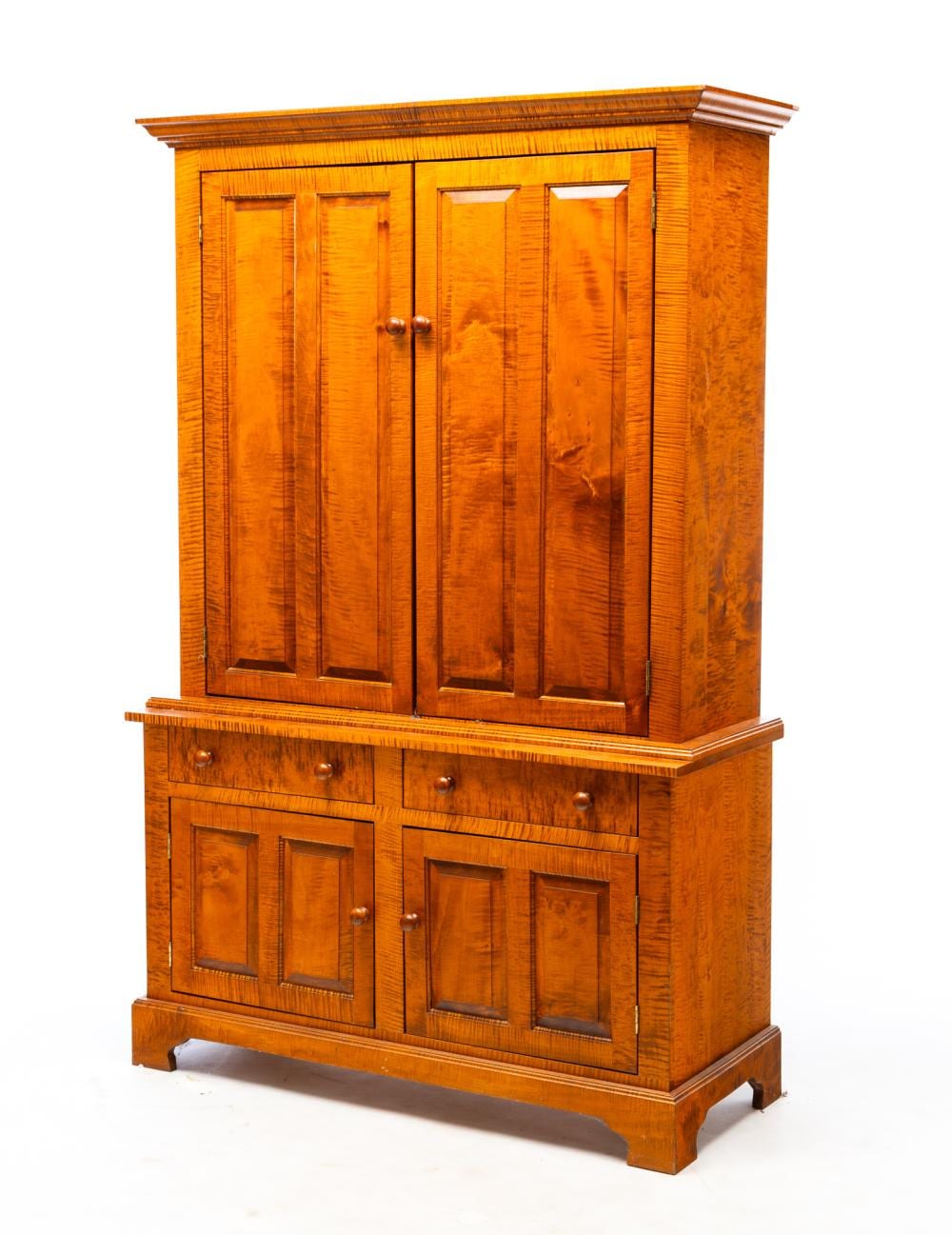 Eldred Wheeler comparable auction result: eldred wheeler hanover massachusetts tiger maple stepback cupboard