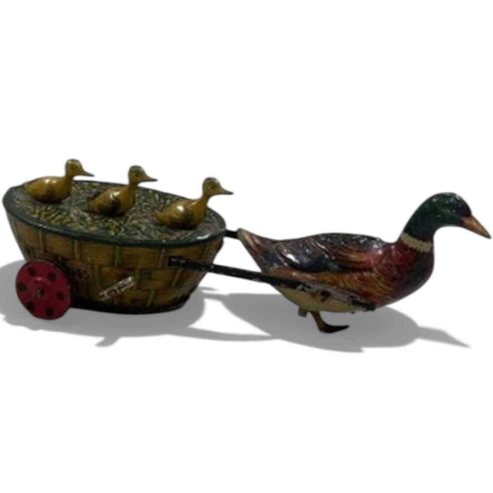 Alfred (1937) Dunn comparable auction result: german tinplate clockwork wind up toy by ernest