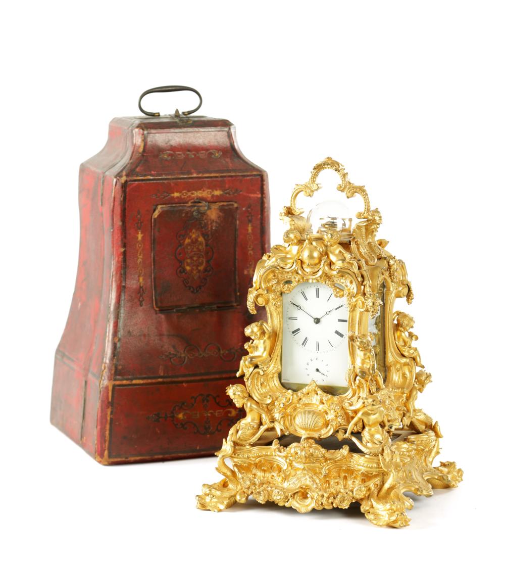 Auguste André Lançon comparable auction result: auguste a paris a fine 19th century french gilt brass rococo striking carriage clock on stand