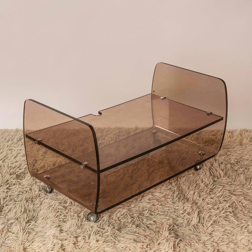 Michel Dumas comparable auction result: michel dumas france 20th century for roche bobois hi fi tv cabinet 70s smoked plexiglas on casters shows signs of wear due to use and age