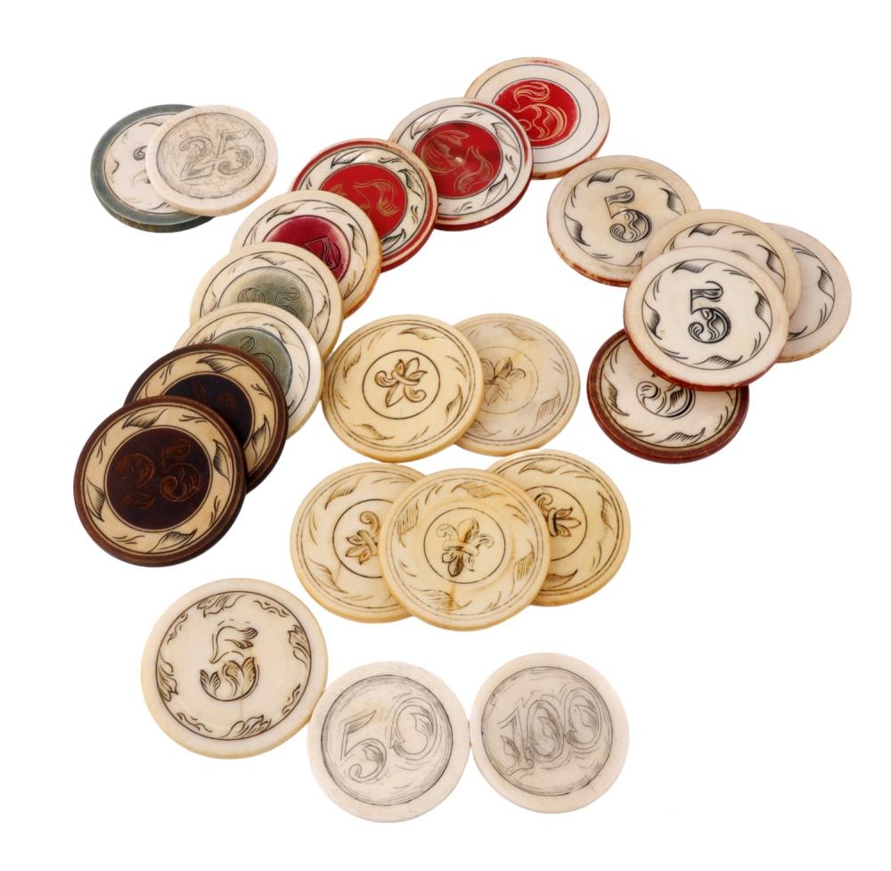 Group of poker chips with etched designs, including red and beige chips with decorative line art and numerals.
