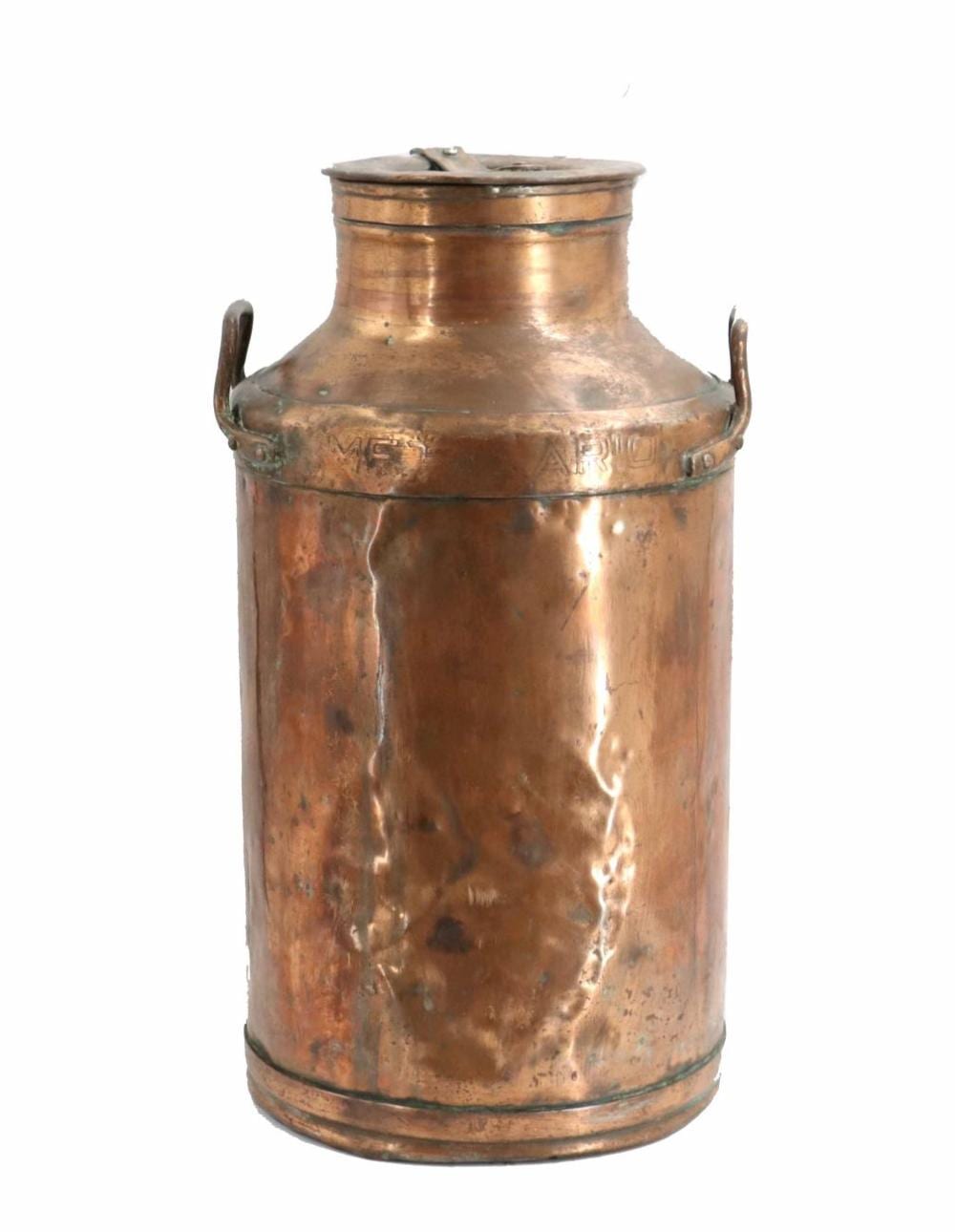 Vintage copper milk can with a round body, domed lid, and two side handles, photographed against a white background.