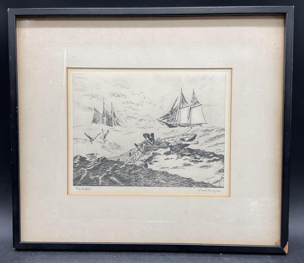 Framed black-and-white etching print showing sailboats on choppy water with a small cluster of figures near the foreground