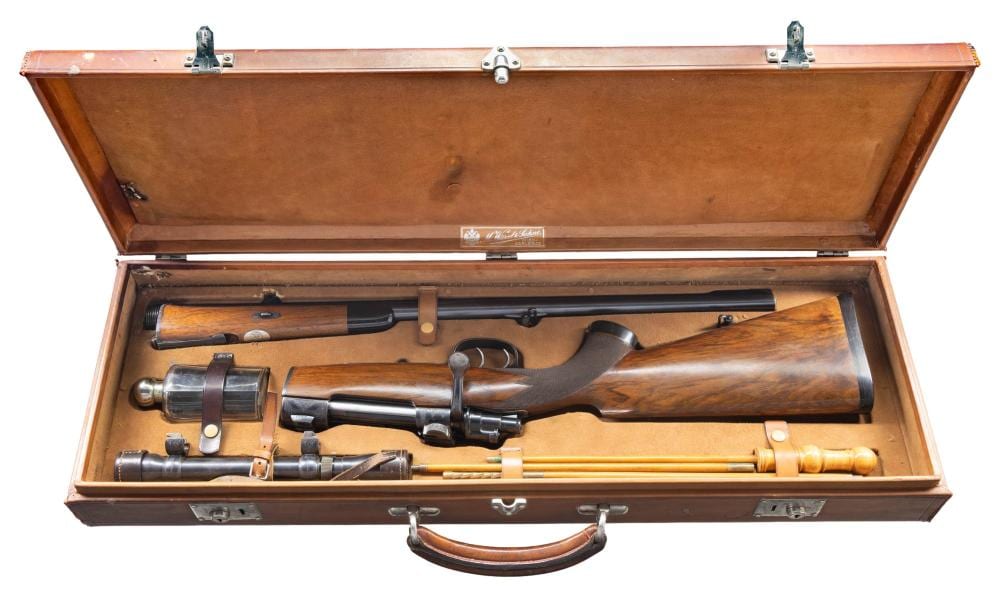 J. C. J. van der Heyden comparable auction result: very fine cased takedown mauser rifle by j