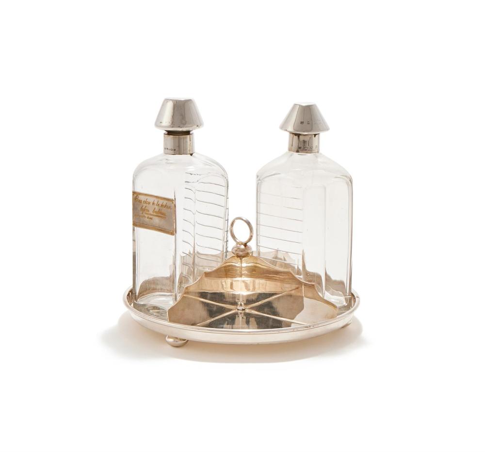 A MATCHED PAIR OF SILVER MOUNTED DECANTERS OR MEDICINE BOTTLES sold by Dreweatts 1759 Fine Sales, lot 343 — auction record photograph