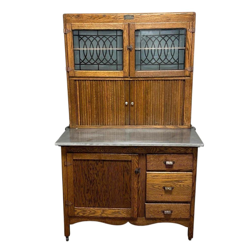 Antique American Oak Hoosier Cabinet sold by Premier Auction Galleries, lot 131 — auction record photograph