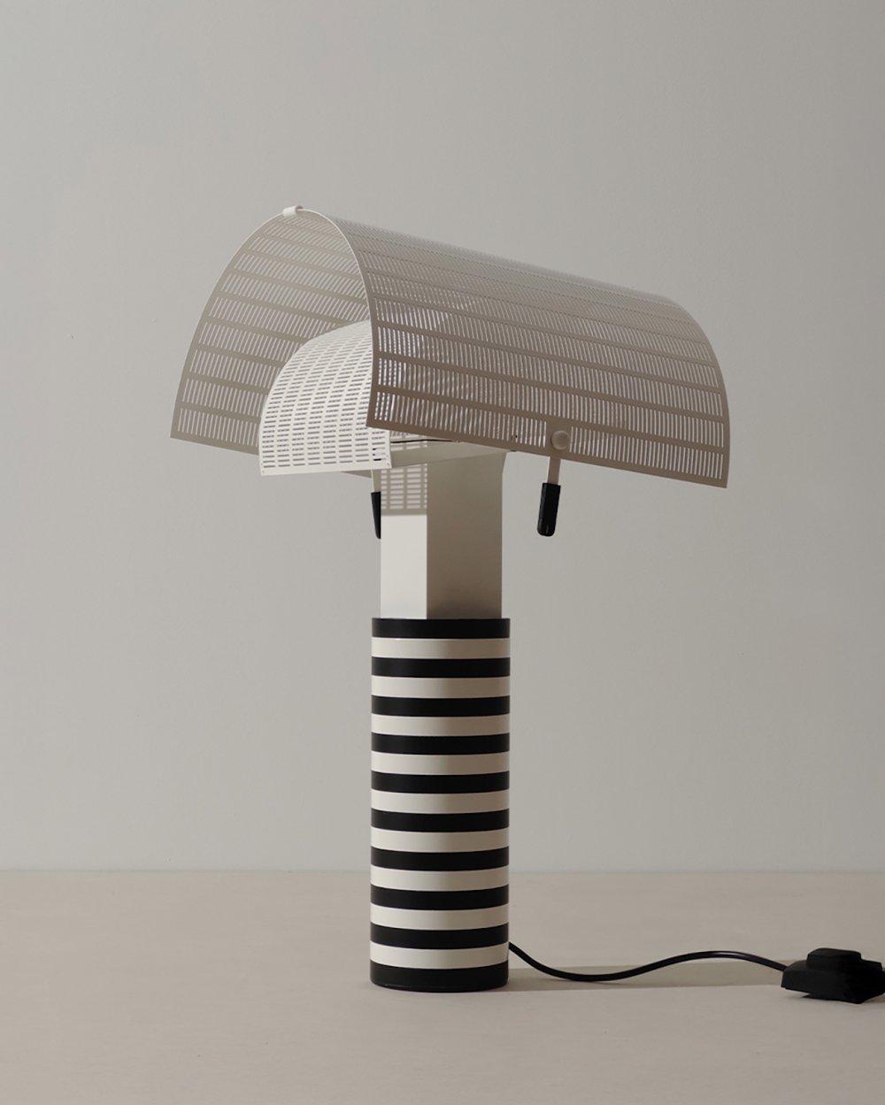 MARIO BOTTA (Switzerland, 1943) for Artemide. Table lamp "Shogun", 1985. In enameled metal. Very exclusive piece as it is a first edition in its original factory box, never used before. sold by Setdart Auction House, lot 268 — auction record photograph