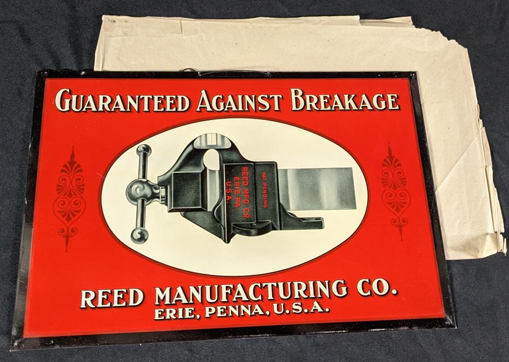 NOS TOC TIN SIGN RED MANUFACTURING CO ERIE PENNSYLVANIA BENCH VISE TOOL sold by Millers Auction Co., lot 301 — auction record photograph