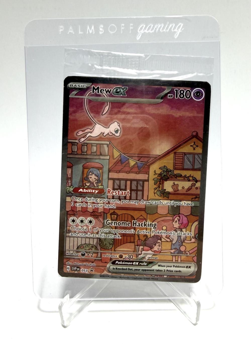 Pokemon Mew ex trading card in a clear plastic display, showing a purple illustrated Mew ex card with “Mewex” and “180” HP.