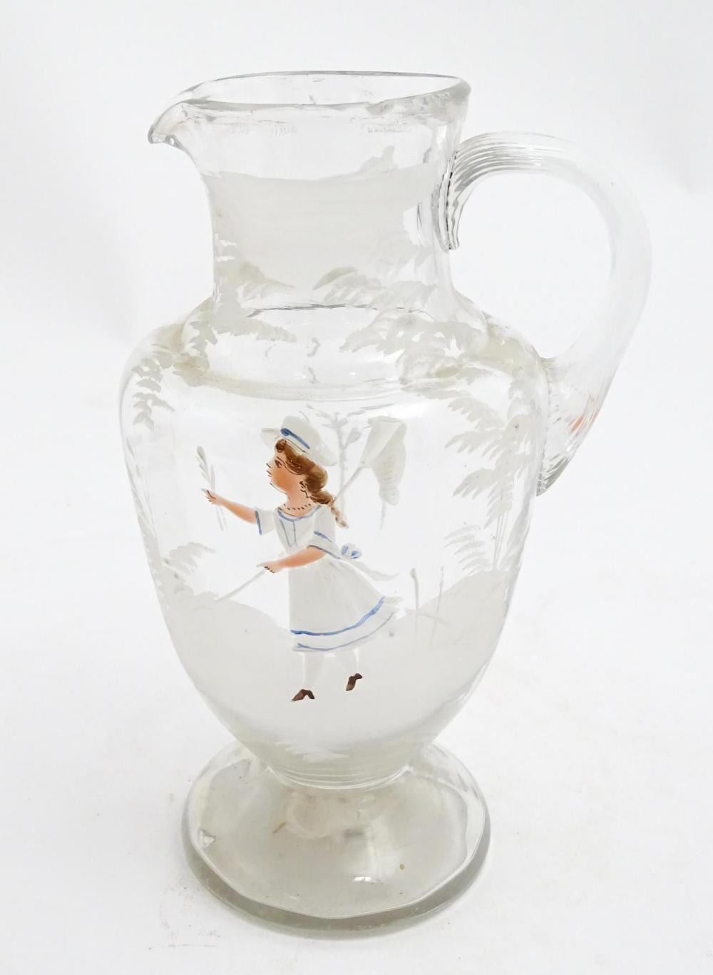 a 19thc clear glass jug with mary gregory style painted decoration approx 9 high · Claydon Auctioneers · 2026-02-22 Mary Gregory comparable auction result: a 19thc clear glass jug with mary gregory style painted decoration approx 9 high