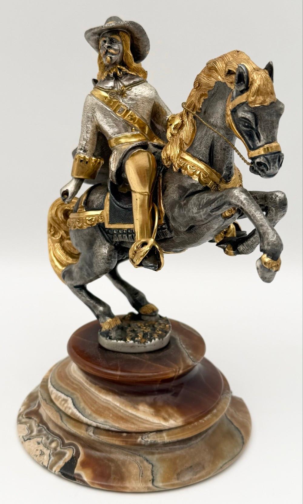 Giuseppe Vasari comparable auction result: giuseppe vasari musketeer on horseback gilded silvered bronze sculpture