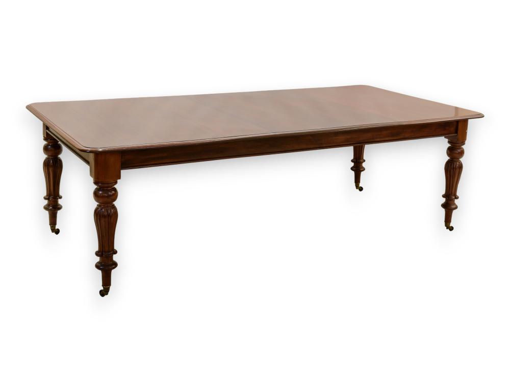 A Victorian Mahogany Dining Table with Turned Legs and Brass Casters, 77cm x 245cm x 122cm sold by 5th Avenue Auctioneers, lot 329 — auction record photograph