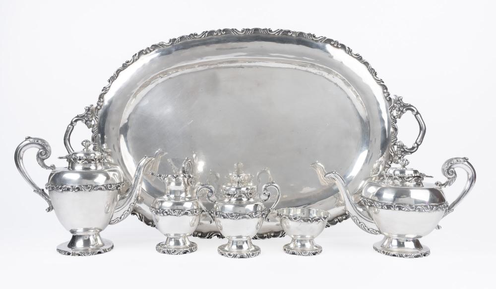 Auction comp thumbnail for Spectacular Sterling Silver Coffee & Tea Set with Tray. Near Mint Condition Boasting Substantial Silver Weight (Goldberg Coins & Collectibles, Lot 1775)